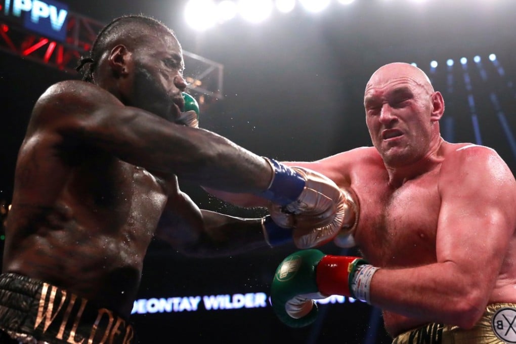Deontay Wilder and Tyson Fury trade blows. Photo: Reuters