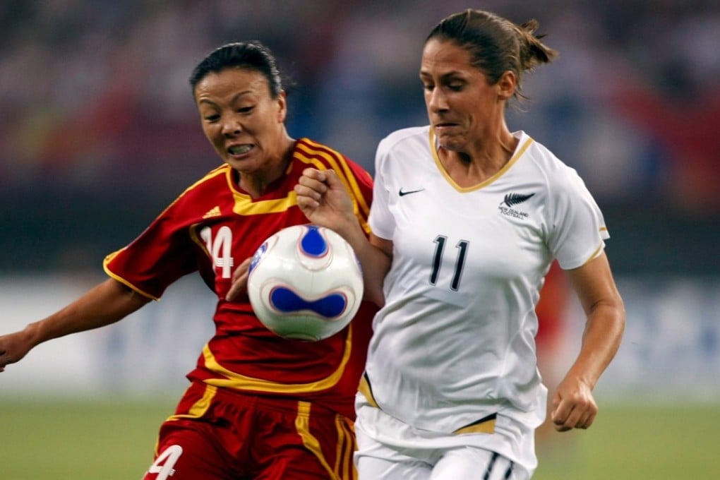 Forward Zhang Ouying (left) of China fights for the ball beside New Zealand defender Marlies Oostdam during the 2007 Fifa Women's World Cup in China. Photo: EPA