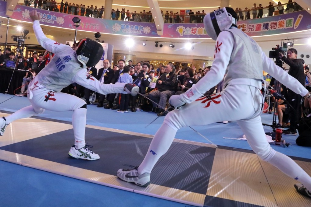 Lawrence Ng and Edgar Cheung battle it out at Discovery Park shopping centre in Tsuen Wan. Photo: K.Y. Cheng
