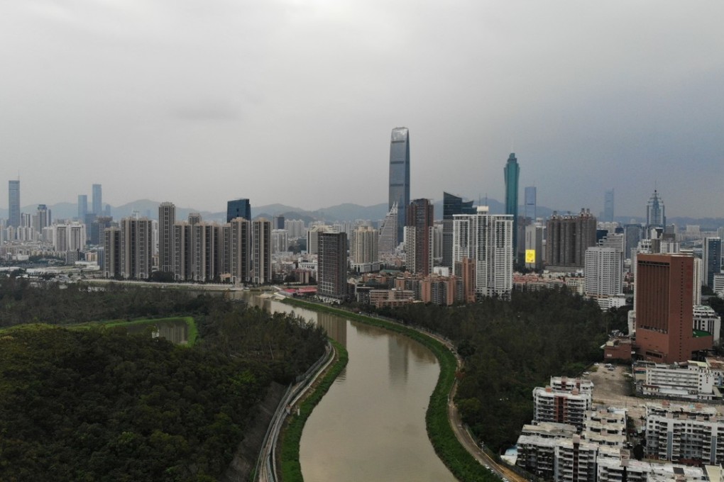 Standing on the hill in Hong Kong's Lo Wu area to overlook the skylines of Shenzhen on 13 November, 2018, the once rural village became one of the largest and most modern cities of China. Photo: SCMP/ LEA LI