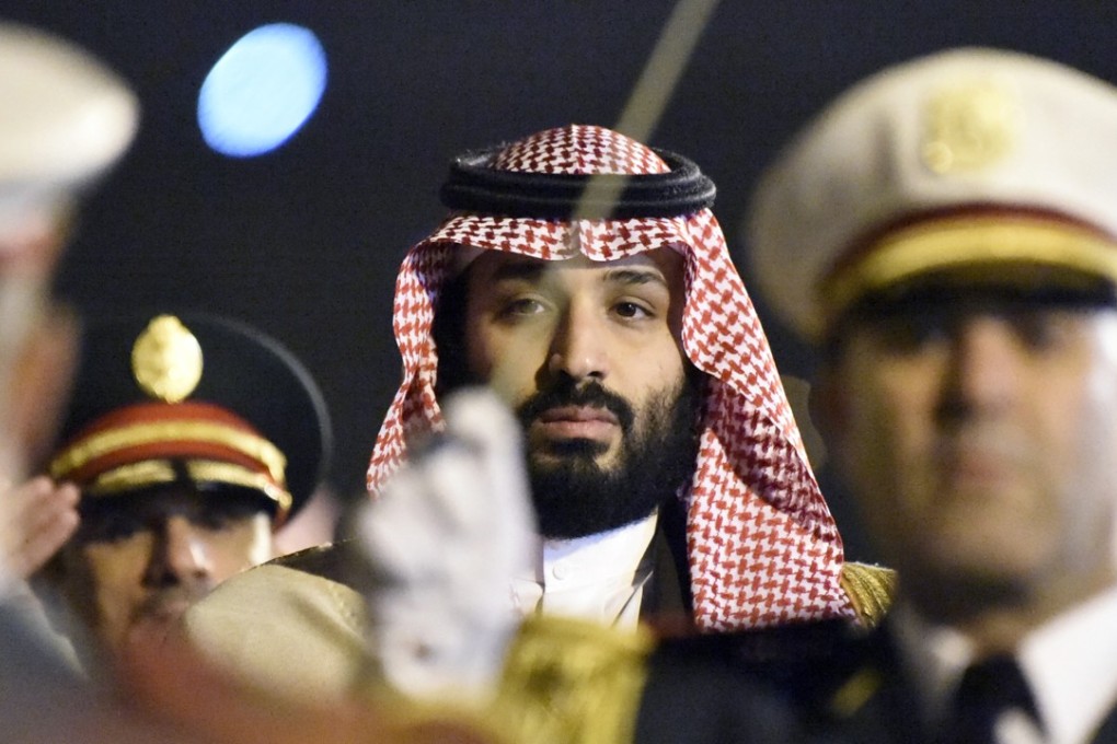 Saudi Crown Prince Mohammed bin Salman is seen behind a military band upon his arrival at Algiers International Airport, southeast of the capital Algiers on December 2, 2018. Photo: AFP