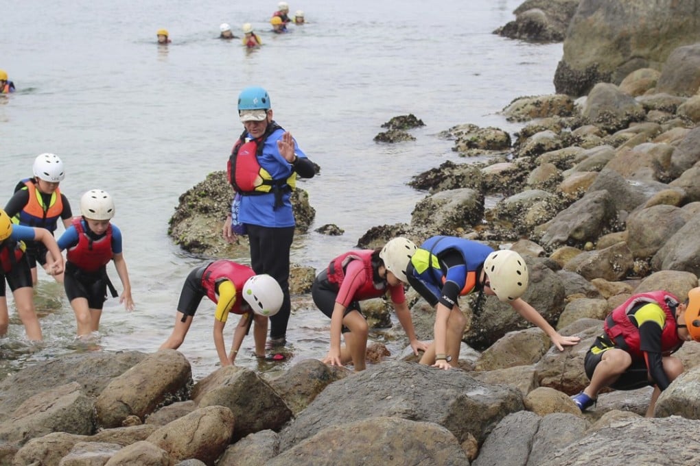 Children coasteering around Sharp Island in Hong Kong, one of the activities offered by A Team EdVentures. Photo: A Team EdVentures