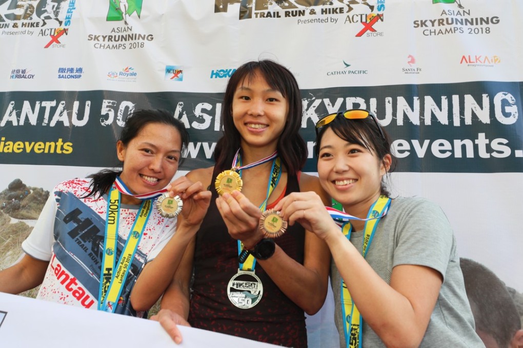 Hong Kong’s Cheung Man-yee poses with her gold medal after claiming the Asian championship at the Lantau 50. Photo: Action Asia Events