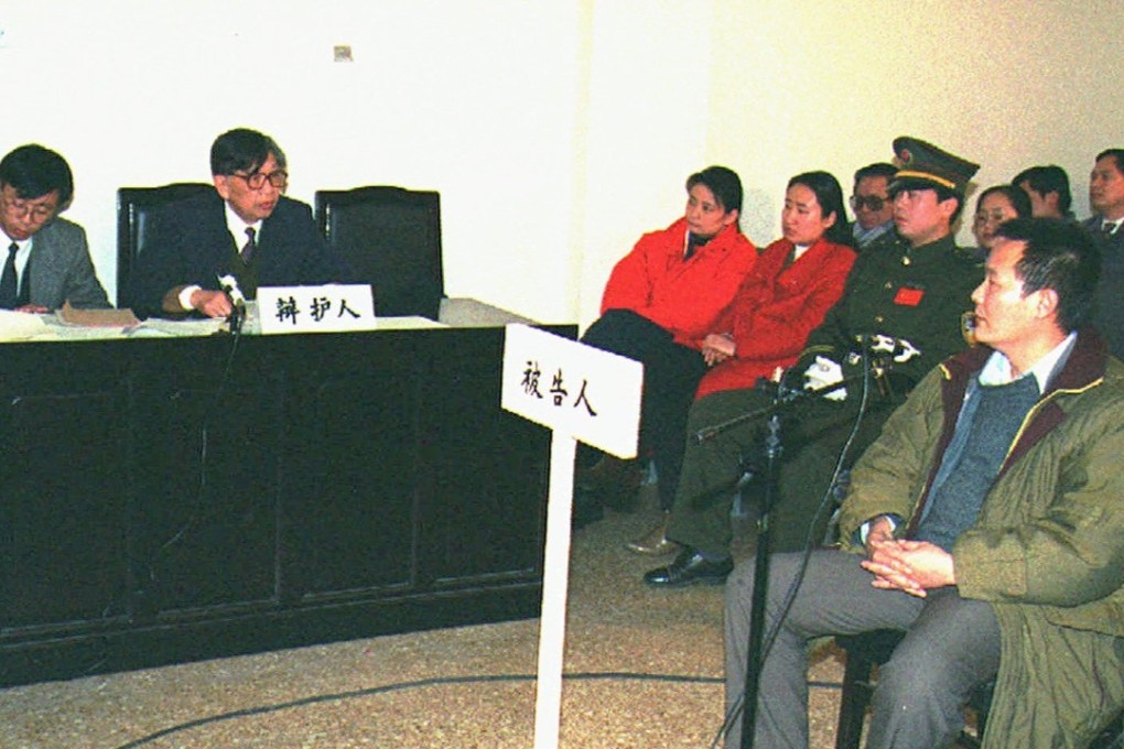 Chinese dissident Wei Jingsheng, right, at the Beijing Intermediate People's Court in 1995. He was later exiled to the US. Photo: AP