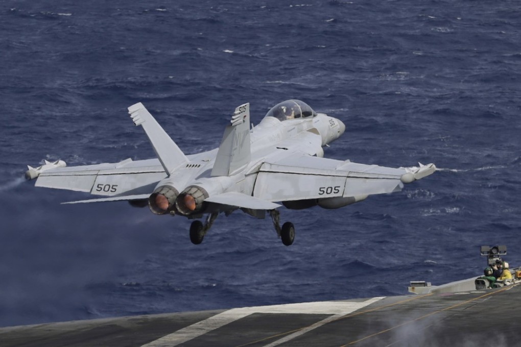 A fighter jet takes off on the deck of the US Navy’s USS Ronald Reagan in the South China Sea in November. Photo: AP