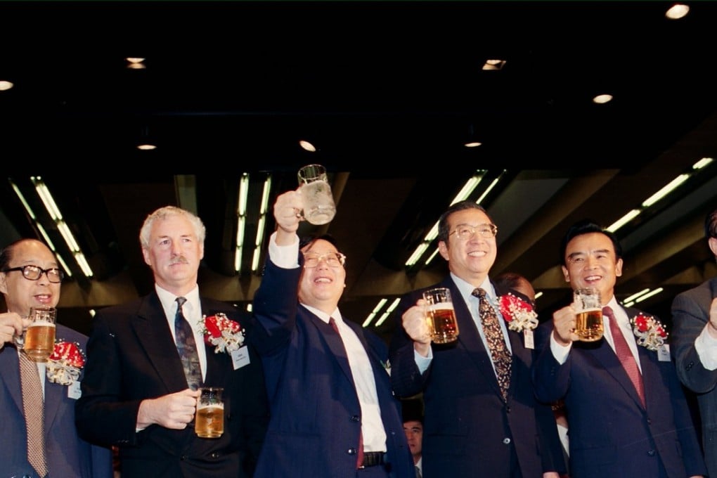 Executives toasting the listing of Tsingtao Brewery on the Hong Kong stock exchange with beer. Tsingtao was the first so-called H share to list in Hong Kong. Photo: SCMP