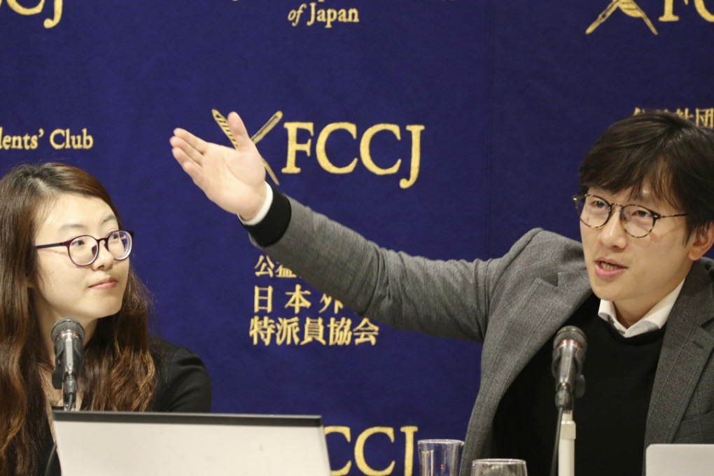 Lawyers representing Korean forced labourers demand compensation for their clients at a press conference on Tuesday. Photo: AP