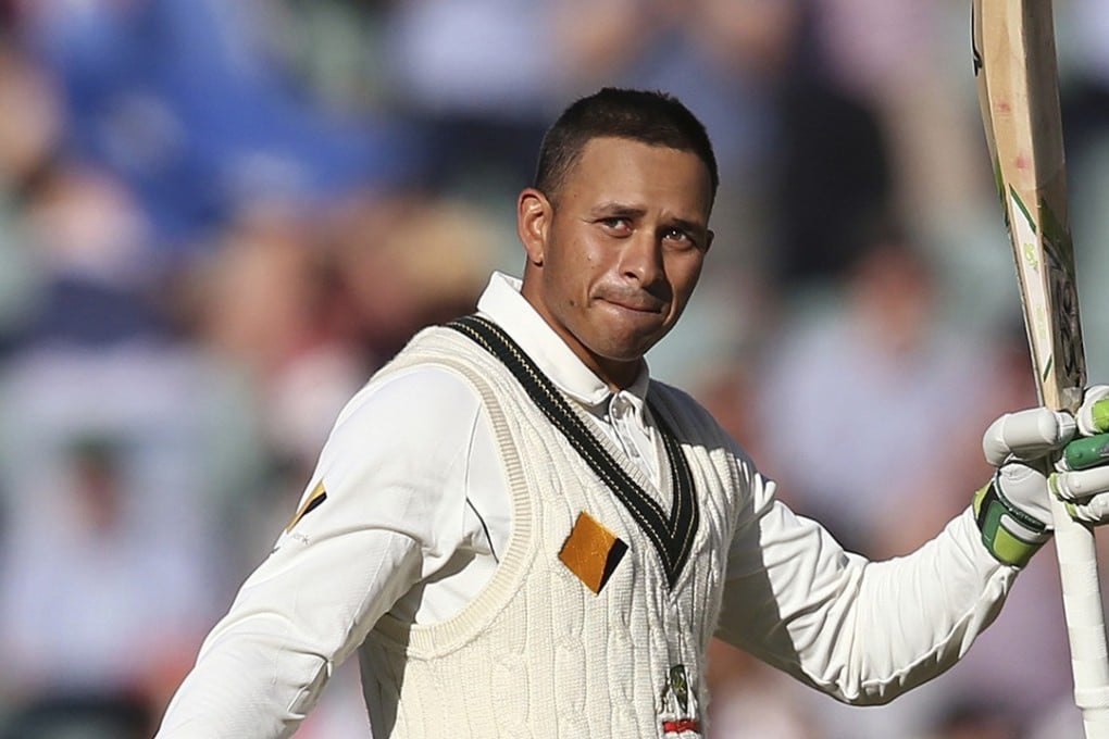 Australia’s Usman Khawaja celebrates making 100 runs against South Africa during their test match in Adelaide, Australia. Khawaja’s brother Arsalan Khawaja has been arrested as part of a counter-terrorism operation. Photo: AP