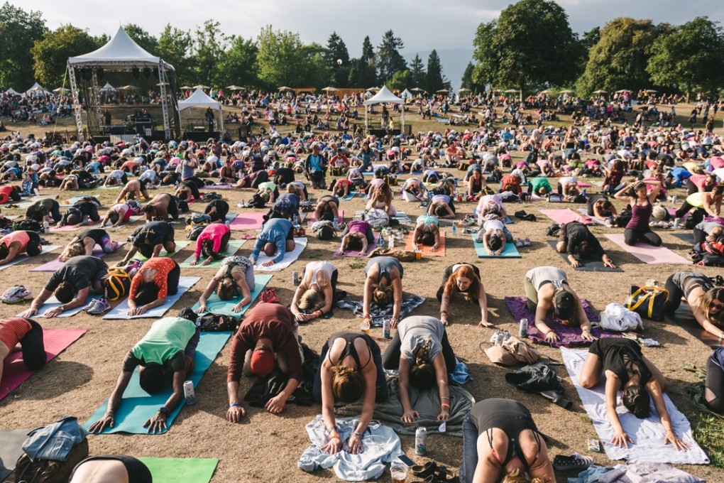 Yoga practitioners at Lululemon’s SeaWheeze 2015 event at Vancouver's Stanley Park on 25 August, 2015. Photo: SCMP/Handout