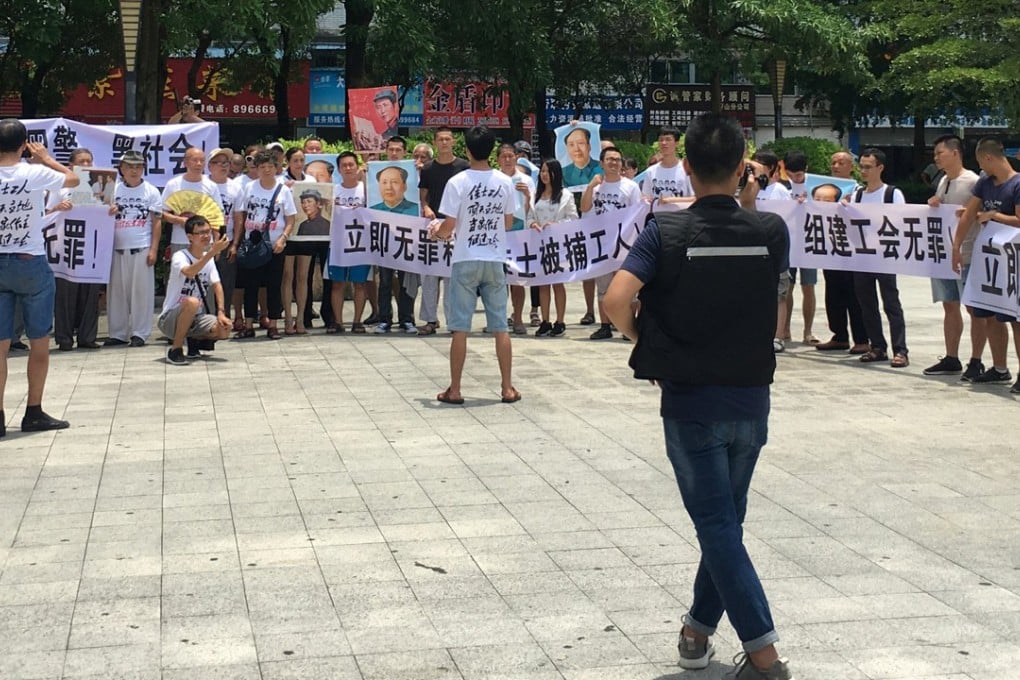 A demonstration in support of Jasic factory workers outside a police station in Shenzhen in August. Photo: Reuters