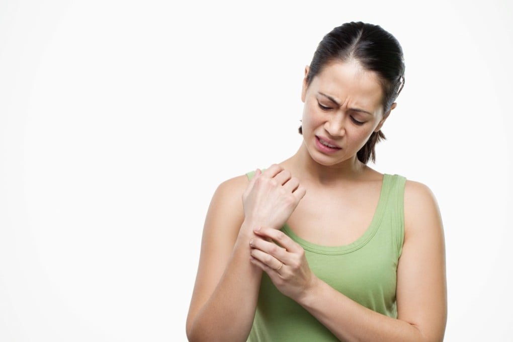 Wrists that spend the day in an extended position at a keyboard and are then forced to extend even further in positions such as downward dog can be particularly vulnerable to tendinitis and carpal tunnel syndrome. Photo: Alamy