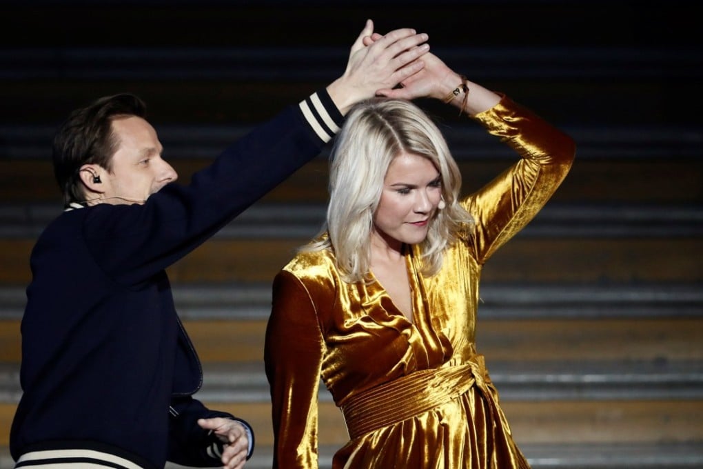 Martin Solveig tries to twirl Ada Hegerberg around on stage at the Ballon d’Or ceremony at the Grand Palais in Paris. Photo: Reuters