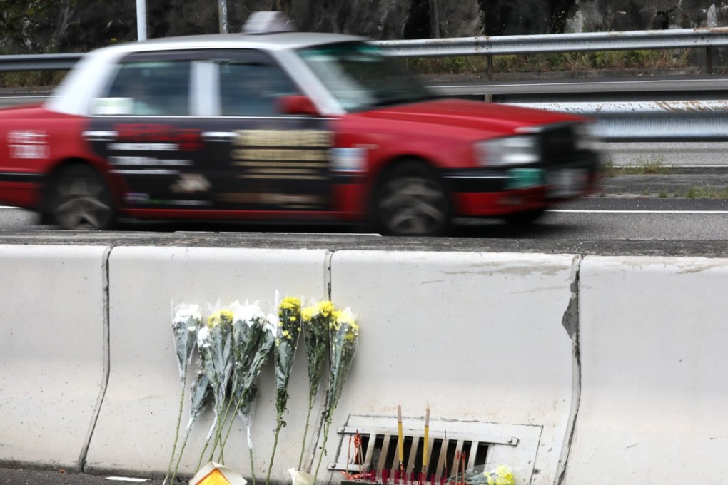 Flowers and incense lit for the deceased of the Tsing Yi Interchange bus crash, at the crash site. Felix Wong