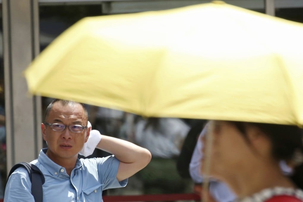 A deadly summer heatwave scorched Japan this year, killing at least 138 people. Photo: AP