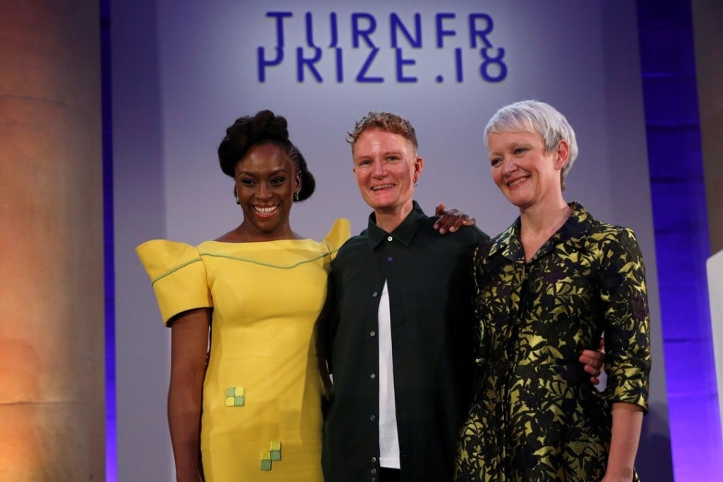 Author Chimamanda Ngozi Adichie, 2018 Turner Prize award winner artist Charlotte Prodger and Tate Director Maria Balshaw pose during a photocall at Tate Britain in London on Tuesday. Photo: Reuters