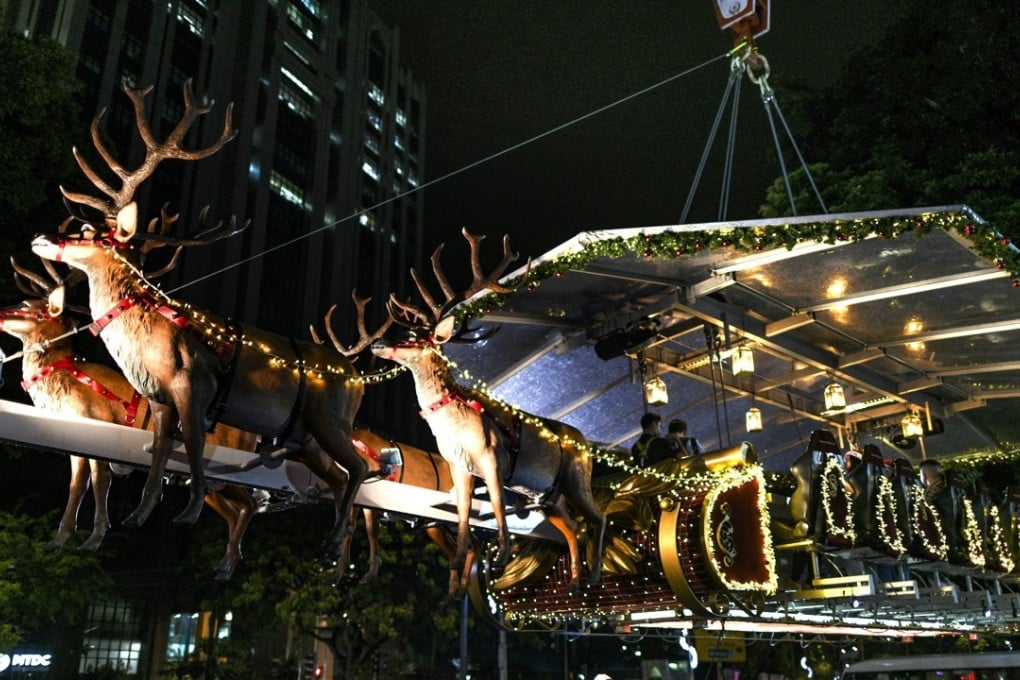The hanging restaurant is raised by a crane in Kuala Lumpur. Photo: AFP