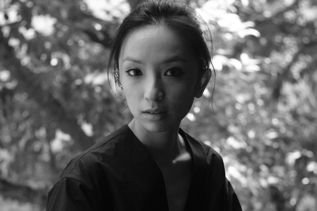 Jacqueline Au Mae-yin, founder and creative director of Loft Bridal, opens her wardrobe.