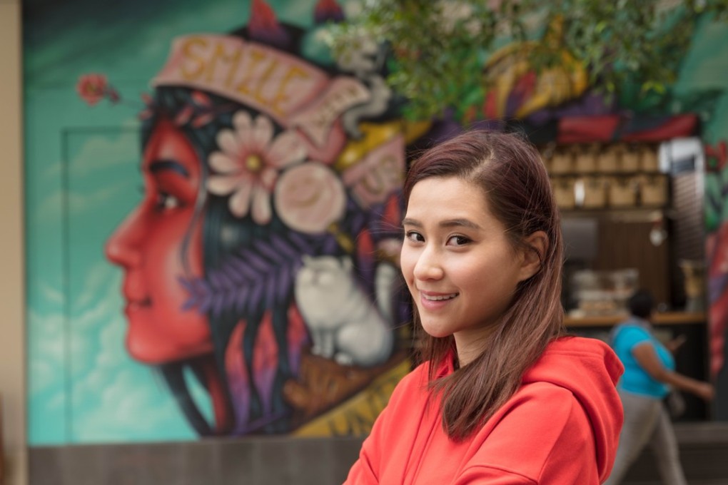 Stanley Ho’s daughter Laurinda Ho in front of the mural of her at the Graffiti cafe in the InterContinental Perth, the 27-year-old’s first hotel project.