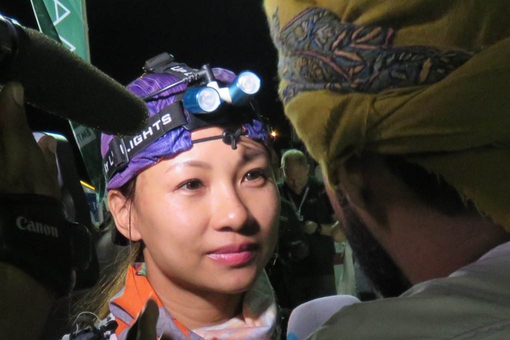 Samantha Chan being interviewed at the finish of the 2018 Oman by UTMB ultra race. Photos: Pavel Toropov