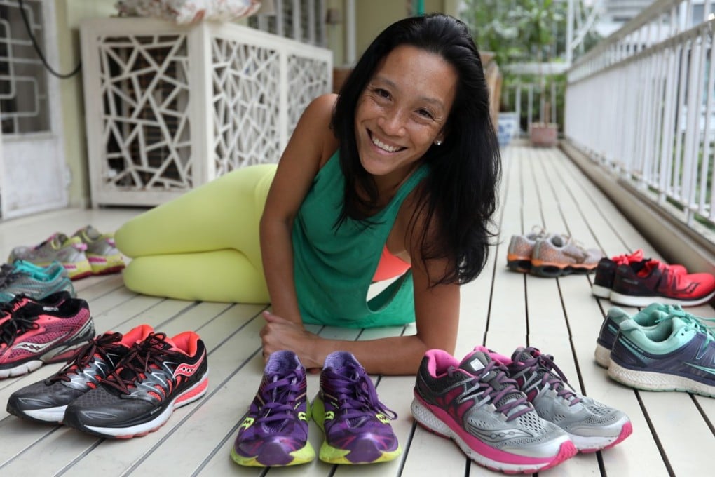 Serial marathon runner Ming Chen at home in Hong Kong. If you want to run a marathon, invest in a pair of well-cushioned shoes, the 47-year-old says. Photo: Xiaomei Chen