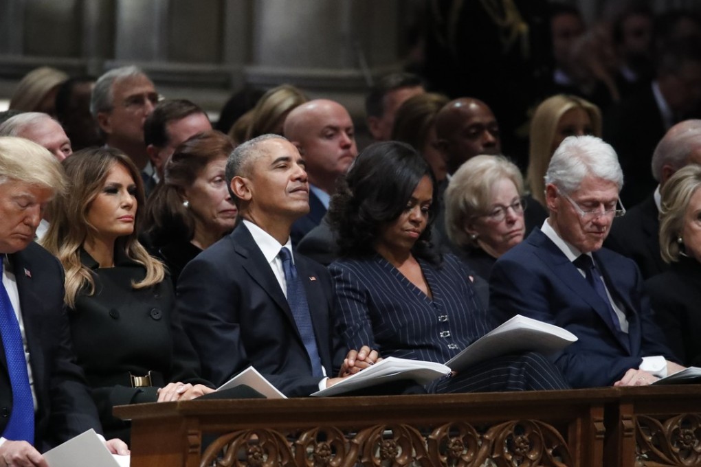 From left, US President Donald Trump, first lady Melania Trump, former president Barack Obama, Michelle Obama, former president Bill Clinton and former secretary of state Hillary Clinton attend the state funeral for former president George H.W. Bush at the National Cathedral in Washington. Photo: ap