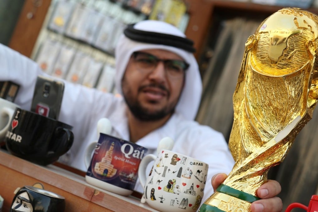 A mock-up of the World Cup is seen at a shop in Souk Waqif in Doha, Qatar. The 2022 edition of the tournament has been marred by endless controversy. Photo: Reuters