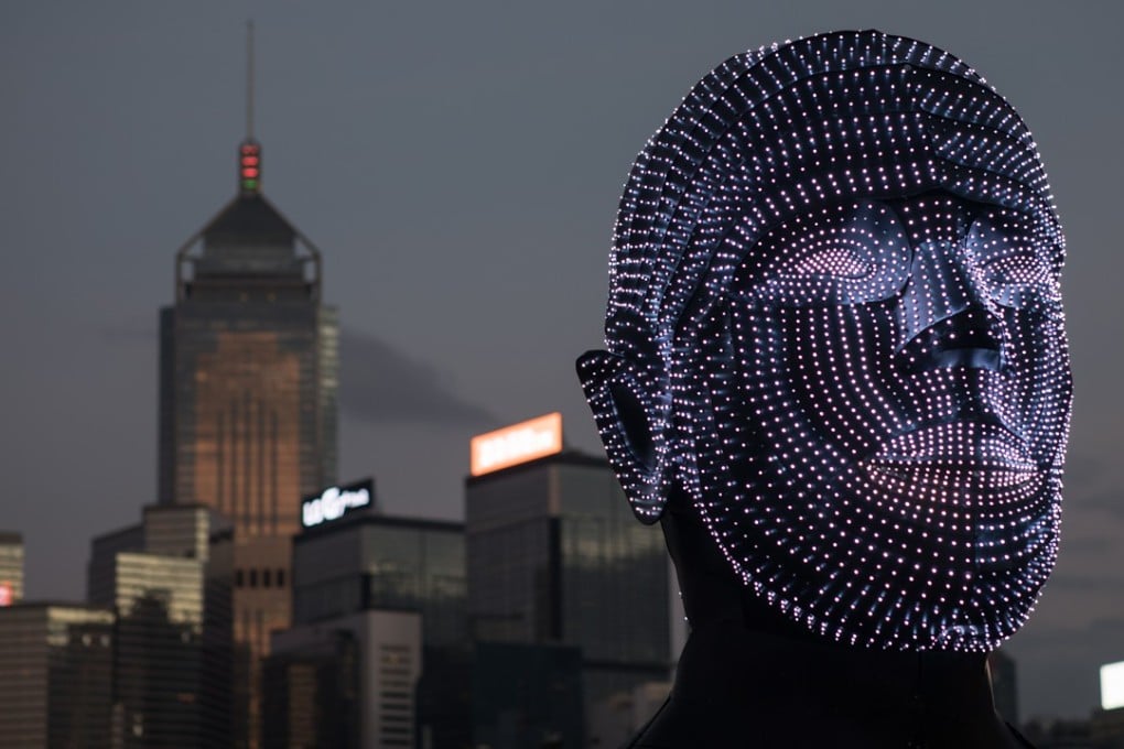 A light installation by Hungarian artist Viktor Vicsek is displayed on the Central harbour waterfront in Hong Kong, on December 3, as part of a pulse light festival. According to the most recent IMD global talent ranking, Hong Kong fell six places to rank 18th in attracting and fostering talent. Photo: EPA-EFE
