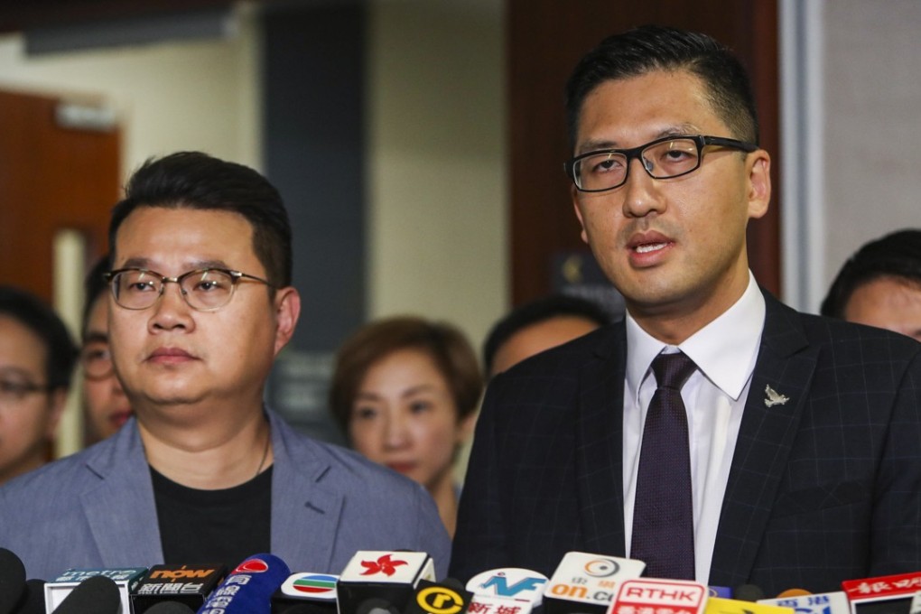 Andrew Wan (left), and Lam Cheuk-ting meet address the media after being told the will be arrested next week over a protest in the Legislative Council in June. Photo: Winson Wong