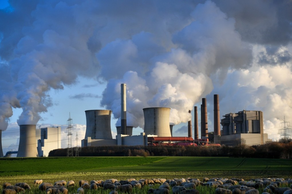 Steam rises from the brown coal-fired power plant Neurath (front-centre) and Niederaussem (rear-left) operated by RWE in Bergheim, Germany. The Rhenish Brown Coal Field is Europe's largest carbon dioxide source. Photo: EPA-EFE