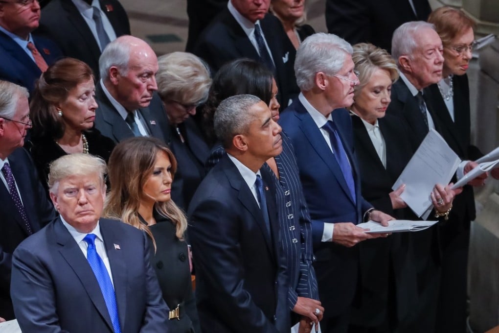 US President Donald Trump (left) attends the funeral of former president George H.W. Bush at the Washington National Cathedral on December 5. Photo: EPA