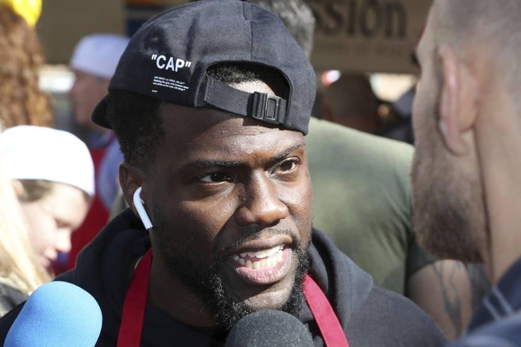 Kevin Hart speaking to the media while volunteering at a Thanksgiving dinner for homeless people in Los Angeles on November 21, 2018. Photo: AP