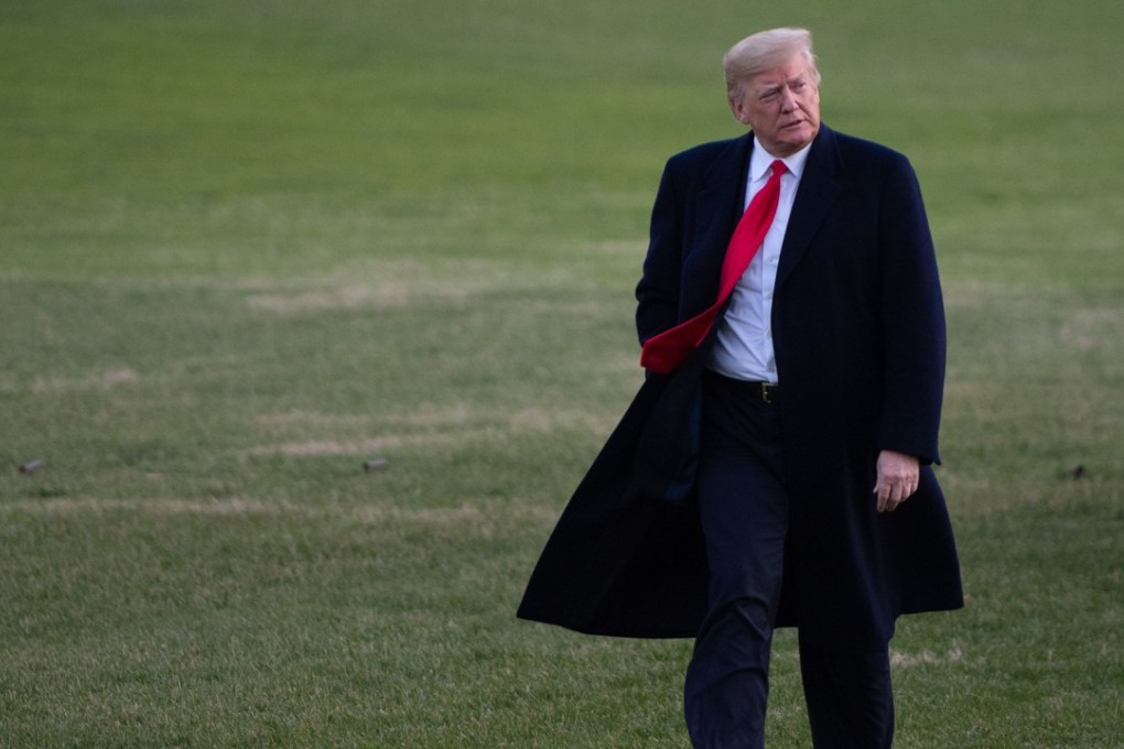 US President Donald Trump walks from Marine One after arriving on the South Lawn of the White House in Washington on December 7, 2018, following a day trip to Kansas City. Photo: AFP