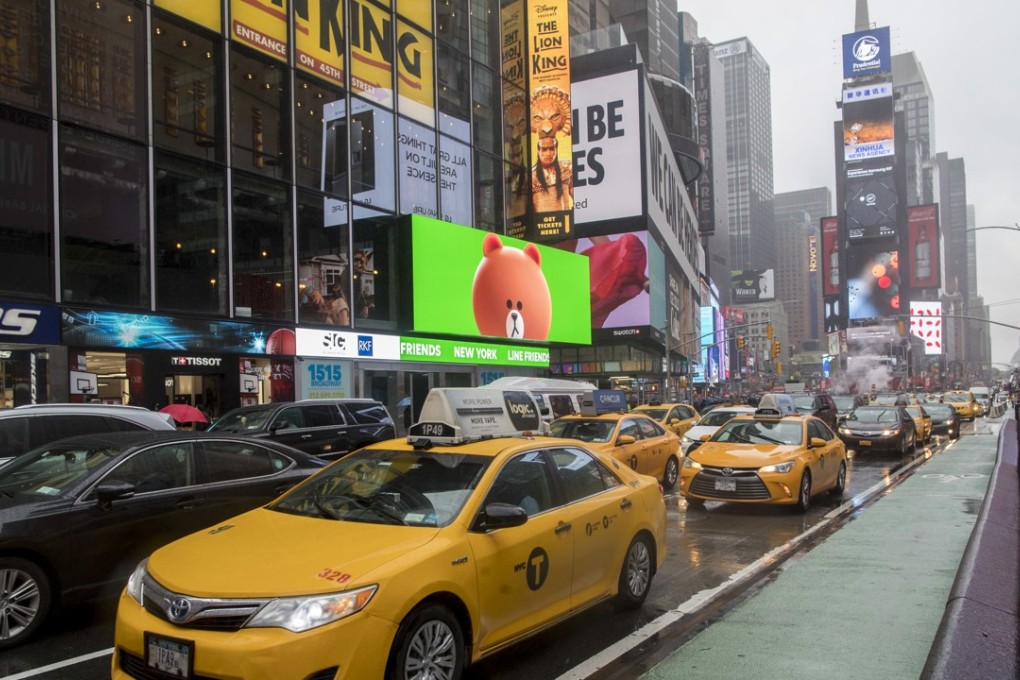 Traffic makes its way down Seventh Avenue in New York's Times Square on May 5, 2017. Photo: AP Photo