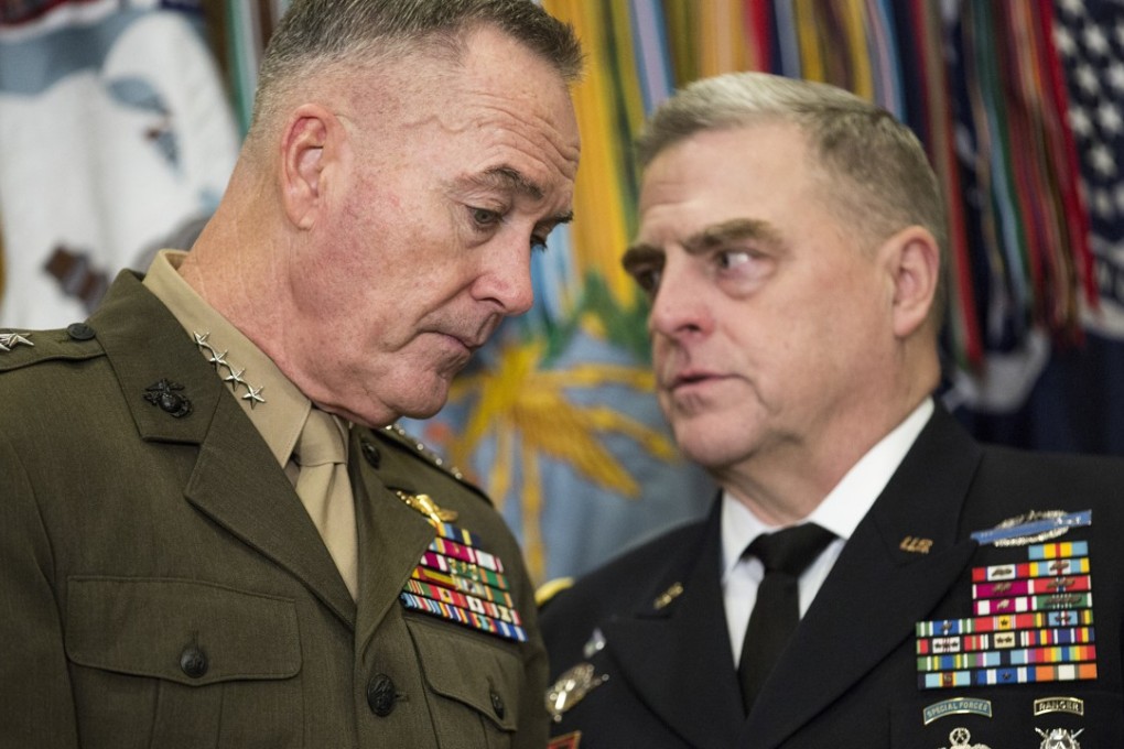 General Joseph Dunford, chairman of the Joint Chiefs of Staff, left, talks to General Mark Milley, chief of staff with the US Army, in Washington, D.C. Photo: Bloomberg photo by Joshua Roberts