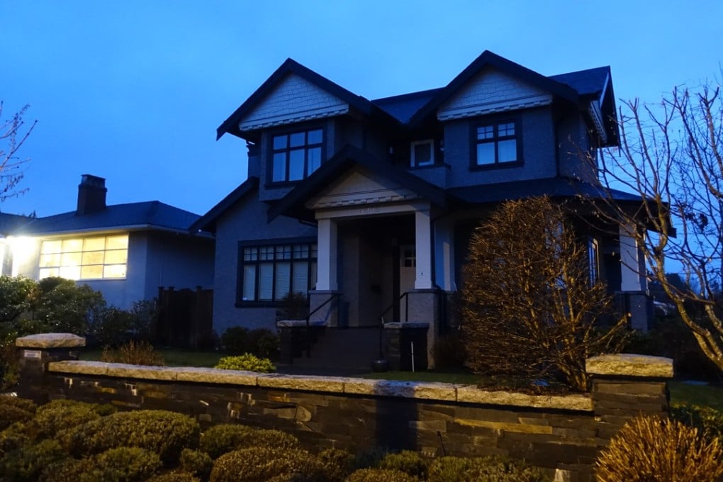 A home on Vancouver's West 28th Avenue, owned by Sabrina Meng Wanzhou's husband, Liu Xiaozong. The home was darkened on Sunday night, after an attempted break-in that morning. Photo: Ian Young