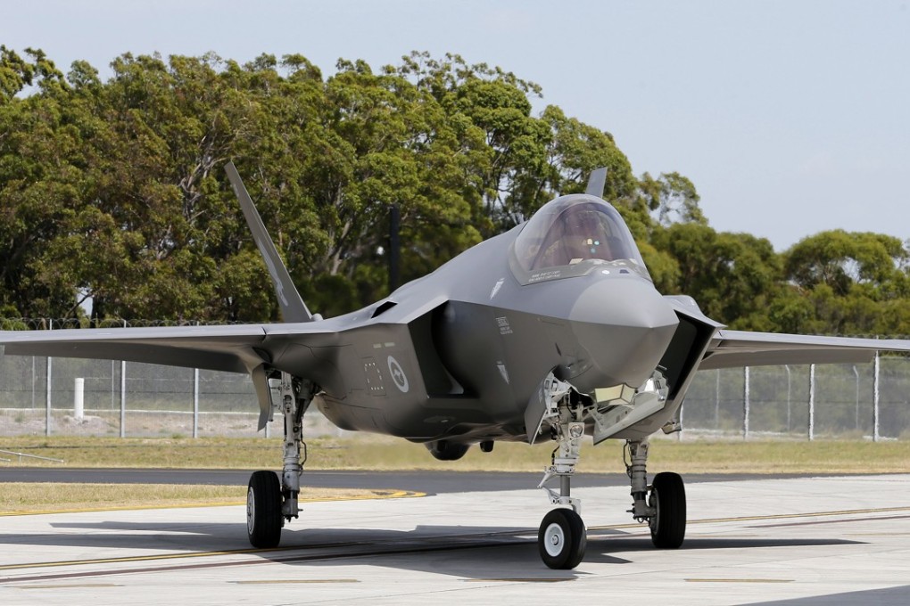 The first of two F-35A Joint Strike Fighters arrives at Williamtown RAAF base outside Newcastle, Australia. Photo: EPA