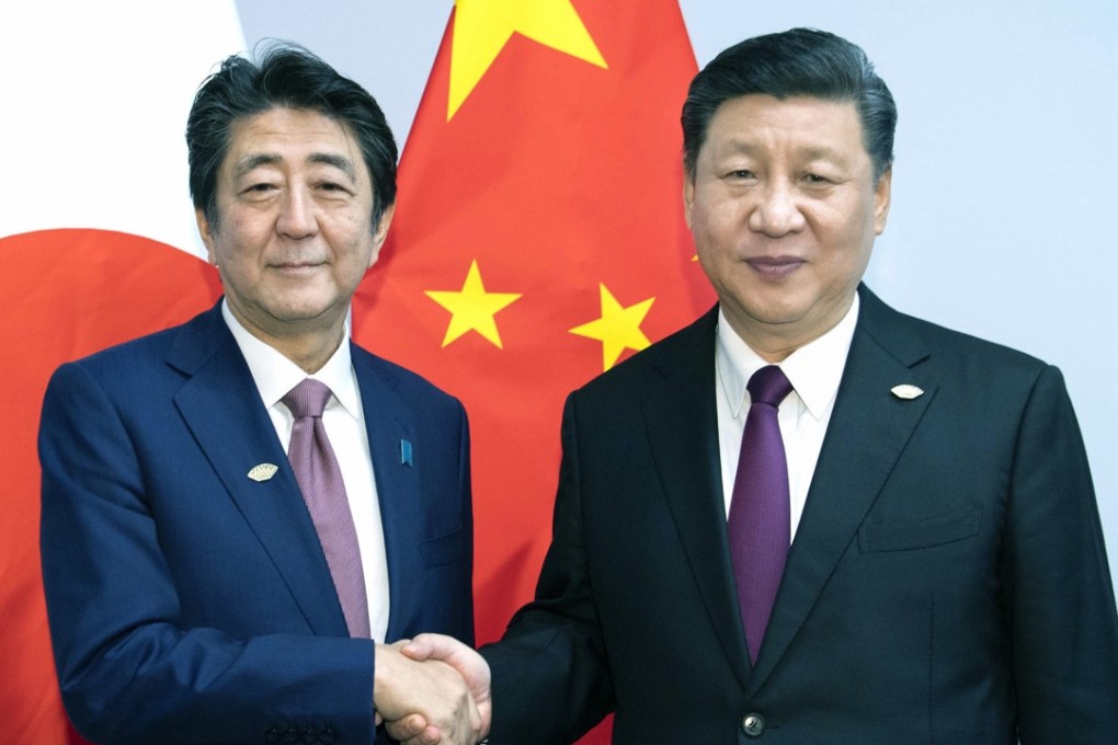 Japanese Prime Minister Shinzo Abe and Chinese President Xi Jinping. Photo: Xinhua