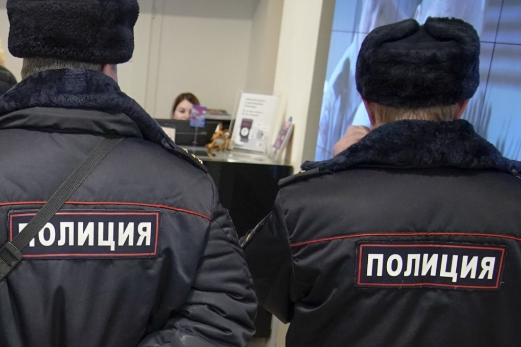 Russian police officers. A former Russian policeman, already jailed for killing 22 people, has been convicted of another 56 murders. Photo: AP