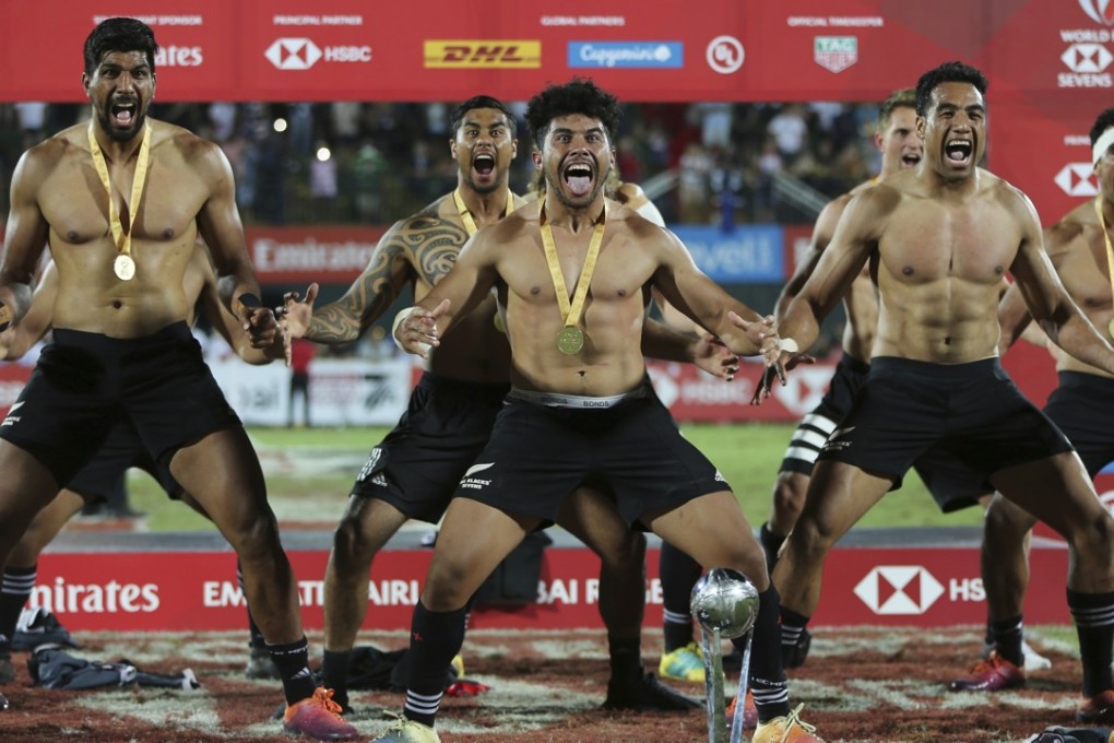 New Zealand players perform the haka after they beat the USA in the Dubai Sevens final. Photo: AP