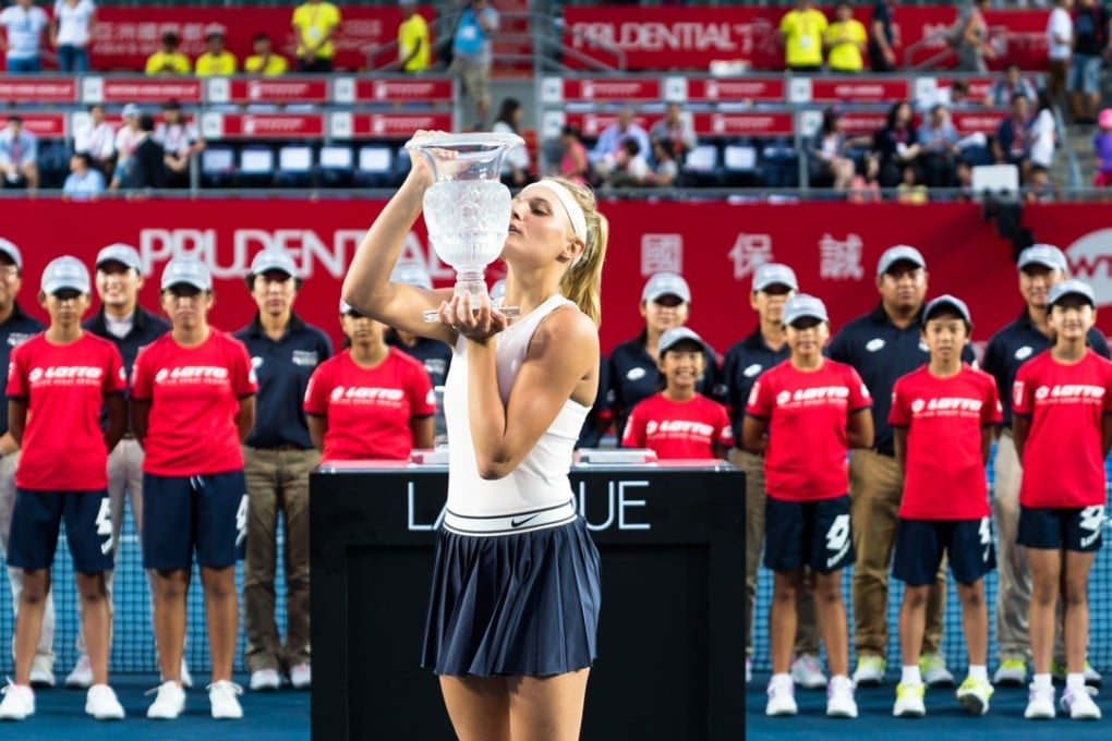 Ukraine’s Dayana Yastremska lifts the Hong Kong Open trophy on October 14 at Victoria Park. Photo: Andy Cheung