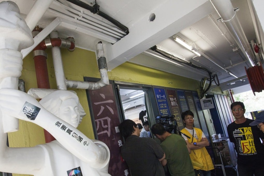 A statue of the 'Goddess of Liberty' stands on display as people assemble near the entrance of the June 4 Museum at its temporary home in the Shek Kip Mei Jockey Club Creative Arts Centre in Kowloon, Hong Kong in April 2017. Photo: EPA