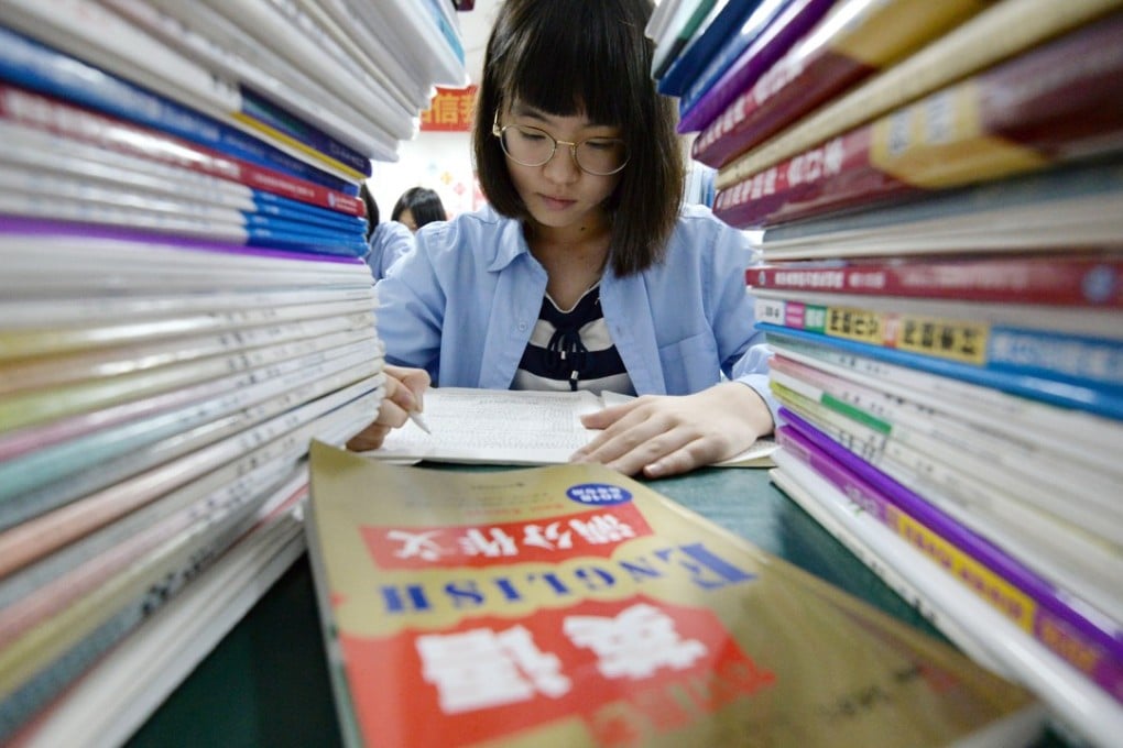 A Chinese student revises for the annual gaokao or college entrance exams in Handan, Hebei province, in May 2018. With an increasing number of Chinese students aiming to go to university abroad, English-proficiency testing has become the focus of attention. Photo: EPA-EFE