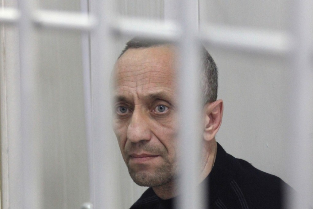 Mikhail Popkov, a former police officer, during a verdict announcement at the Irkutsk Regional Court in the city of Irkutsk, eastern Siberia, Russia, in 2015 when he was convicted of 22 murders. He was given an additional life sentence on Monday for 56 additional killings. Photo: EPA-EFE