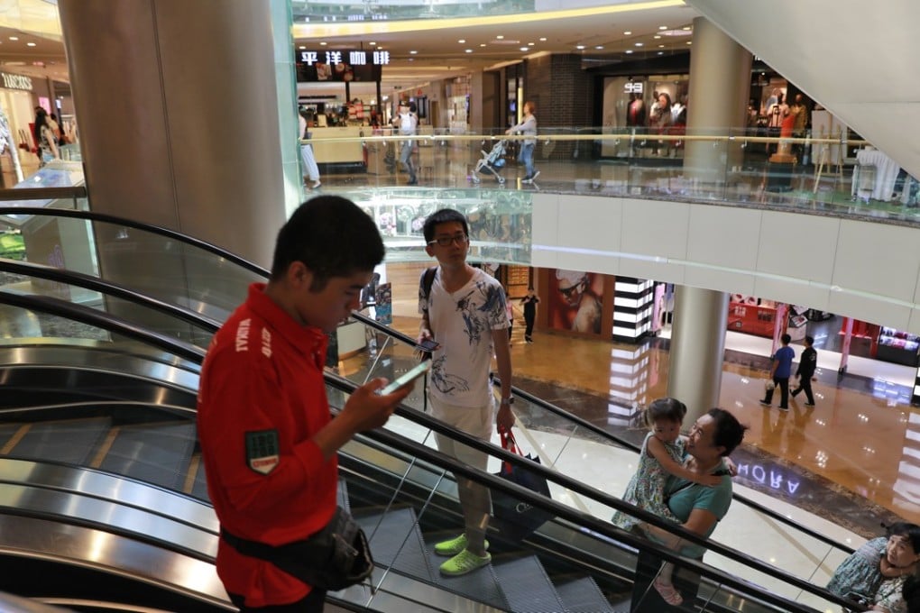 Chinese developers are turning their focus to the commercial property market amid the slump in the residential segment. Photo: EPA