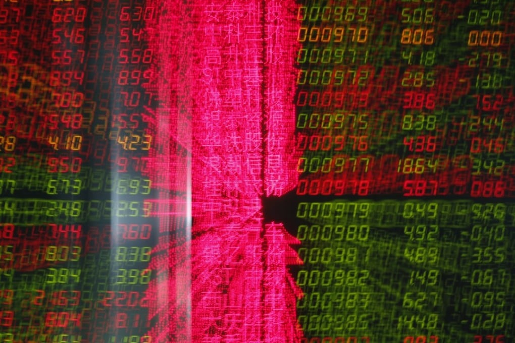An electronic board shows stock prices at a securities brokerage house in Beijing on November 21, 2018. Photo: EPA-EFE