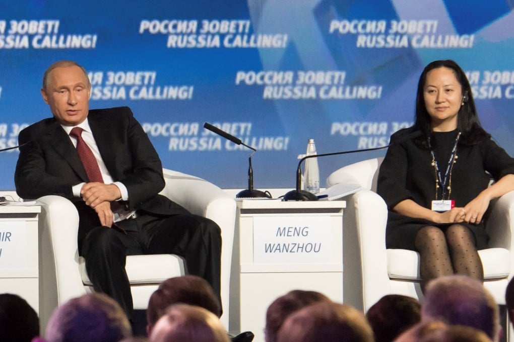 Russia's President Vladimir Putin and Meng Wanzhou, then-executive board director of the Chinese technology giant Huawei, are seen at a session of the VTB Capital Investment Forum in Moscow in 2014. Photo: Reuters
