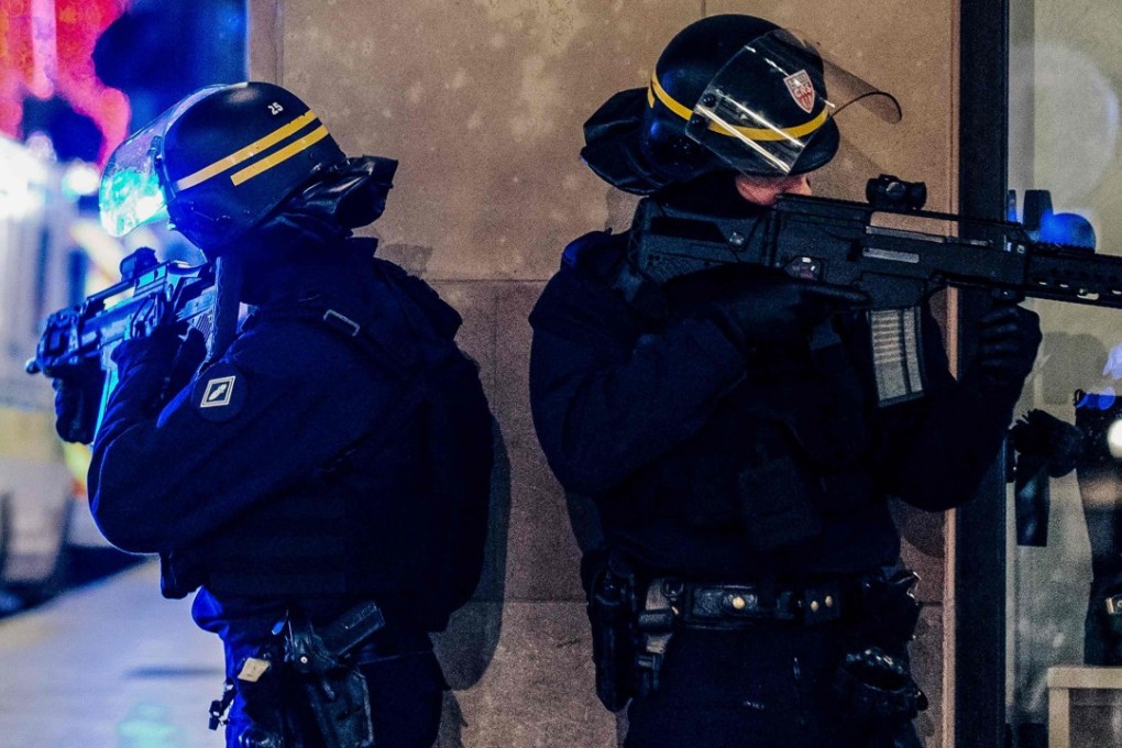 French police at the scene of the shooting. Photo: AFP