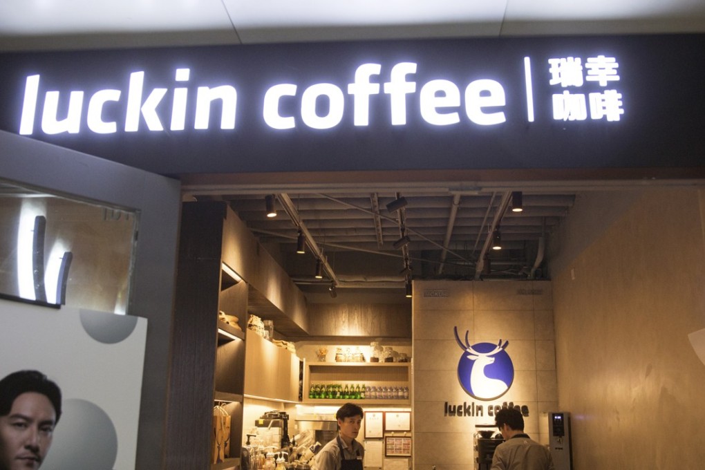 Workers make coffee at a branch of the Chinese coffee chain 'Luckin Coffee' in Beijing, China, 23 May 2018. Photo: EPA-EFE