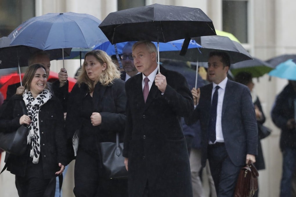 Richard Donoghue, centre, enters Brooklyn federal court on November 13, for the trial of the Mexican drug lord Joaquin ‘El Chapo’ Guzman. Photo: AP