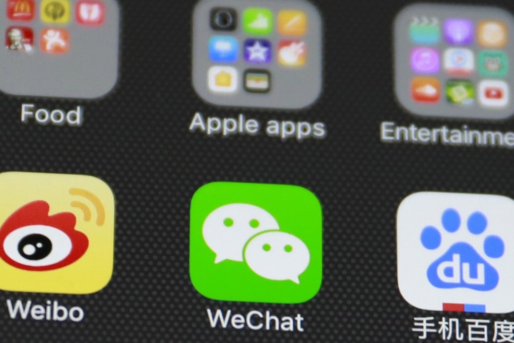 Police in Hubei say they have broken up an operation that made millions of yuan trolling social media websites on behalf of clients. Photo: EPA